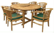 This sturdy round table in teak with six comfy chairs is available from Topiary by Design at a very competitive price. Call us for more information!